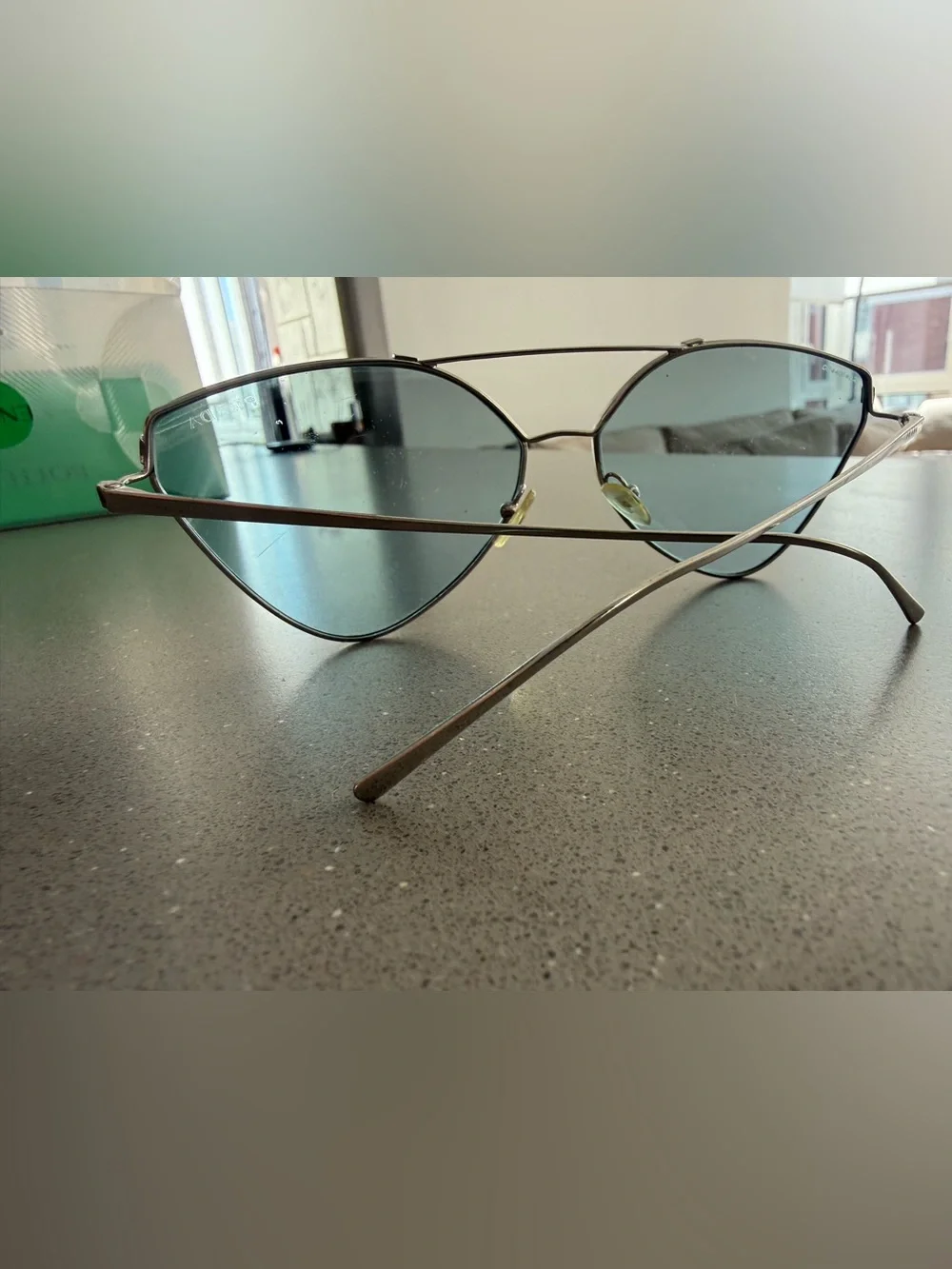 Prada Women's Cat-Eye Sunglasses in Silver with Gray Lenses